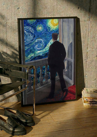 Starry Night by Dikhotomy in a black frame leaning against a concrete wall by a steel chair