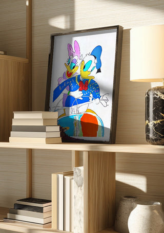 Vacanze Romane (Pop-surrealist take) by NKo in a dark frame on a wooden shelf beside books and a lamp