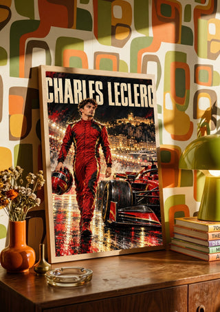 Charles Leclerc by Danii Steinfeldt in a wooden frame on a sideboard against retro patterned wallpaper