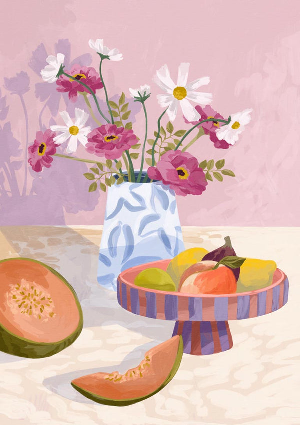 A colorful fruit bowl with guava slices beside a vase of pink and white flowers on a light table.