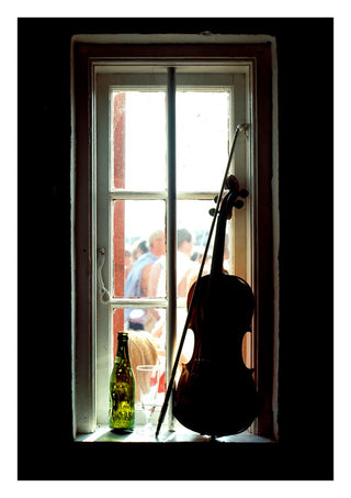 A Nice Day by Bent Hardervig - a violin in a sunlit window with a green bottle, seen from a dark room