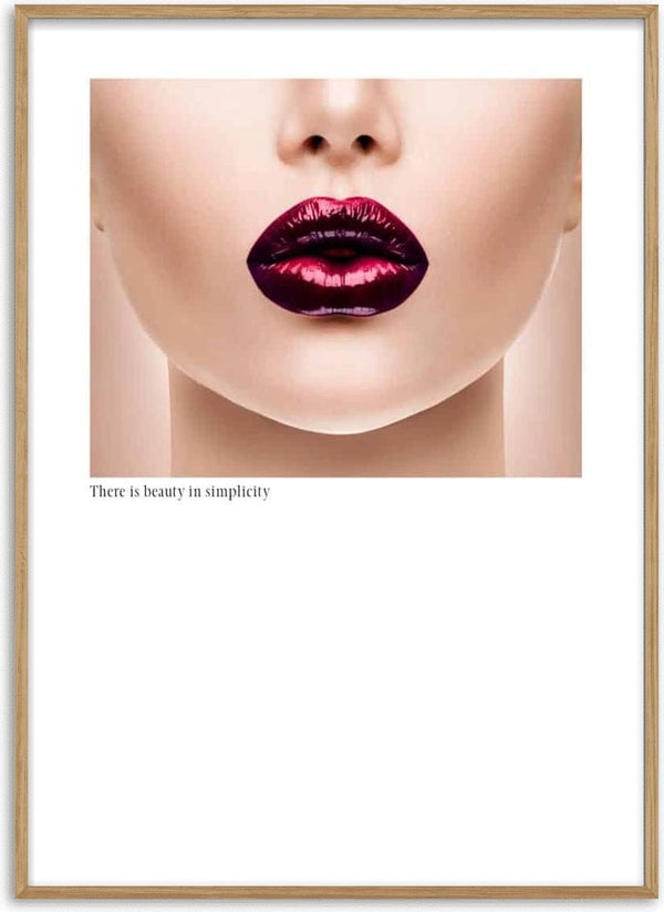 Minimalist fashion poster featuring glossy, dark red lips and the phrase "There is beauty in simplicity."