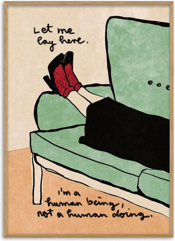 Illustration of a person lounging on a green couch with text: "Let me lay here. I'm a human being, not a human doing."