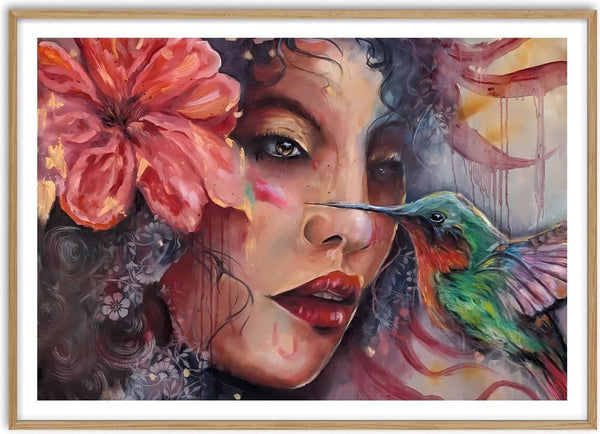 The Light Moment by Elisa Kay - a hummingbird hovering at the lips of a woman with a coral hibiscus in her hair